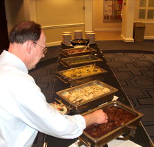 Richard helps himself to the buffet