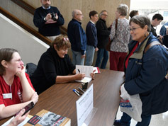 Louise Langberg has Cari Beauchamp autograph her book