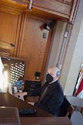 Ben Model, in Topeka from New York, sets up stops and practices movie accompaniment on the Grace Cathedral church organ.