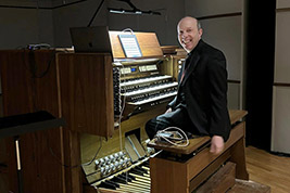 Ben Model provides accompaniment at the organ