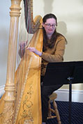 Erin Wood provides dinner music using her harp